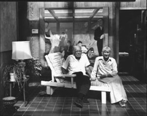 Bill and Jennie Zacha in front of their Charles Marchant Stevenson double portrait (1998).